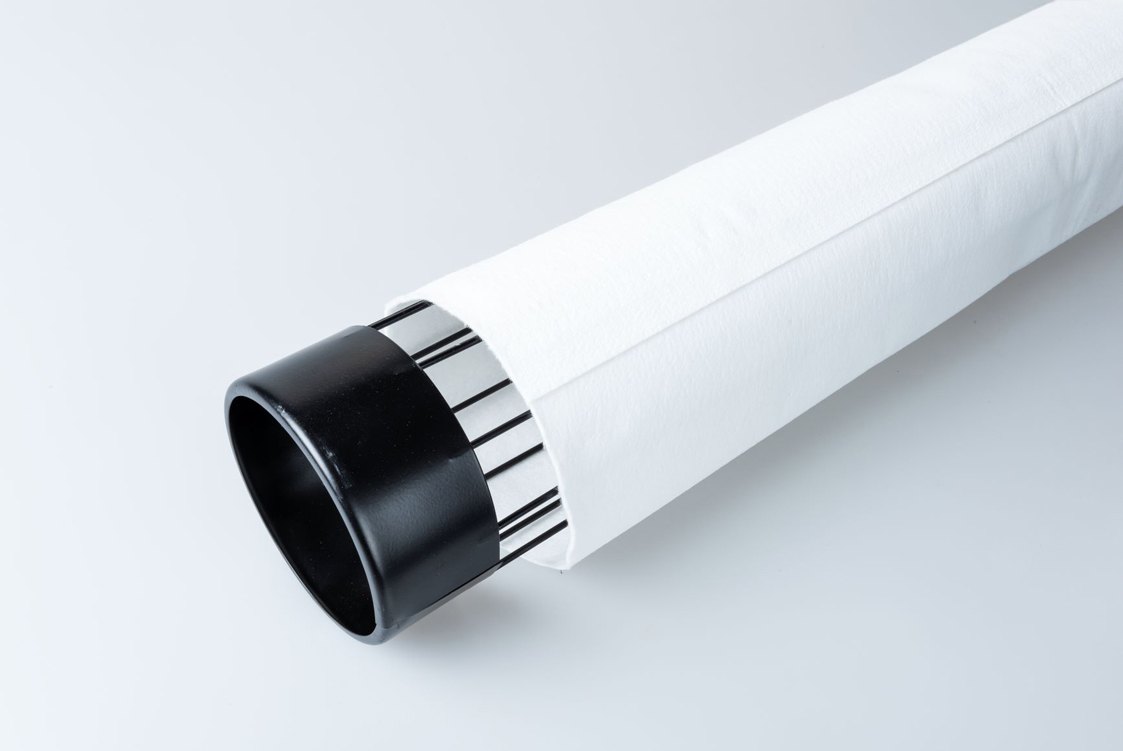 feltro di poliestere con parte superiore solo tagliata per attacco al cestello con fascetta metallica